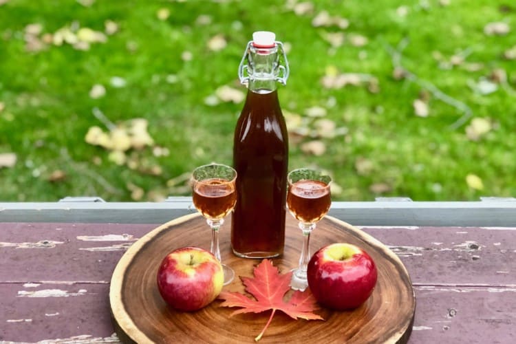 Apple Spice Liqueur in glasses and with decanter
