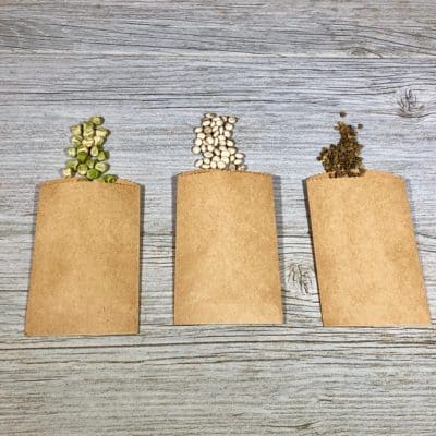 five envelopes with saved seeds - benefits of saving seeds