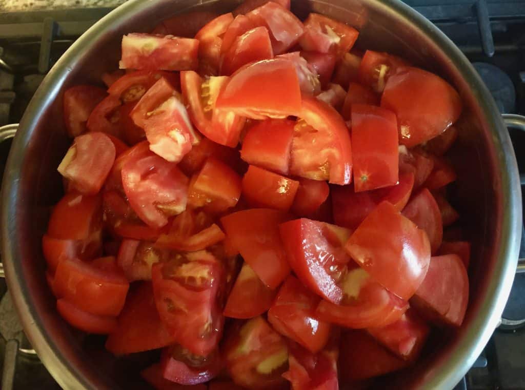 tomatoes in stock pot