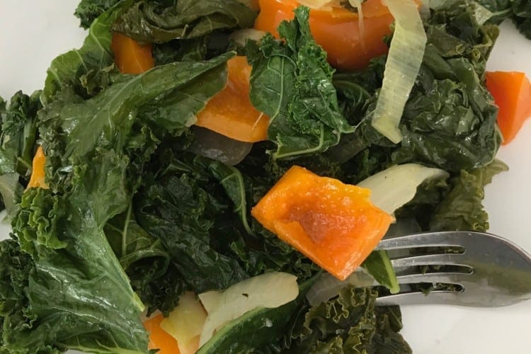 Spicy Garlic Kale with Sauteed Peppers on plate