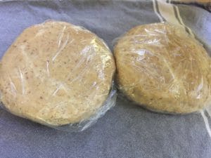 dough wrapped in 5 inch disks