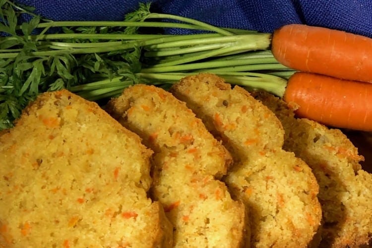 slices of carrot pineapple quick bread on cutting board